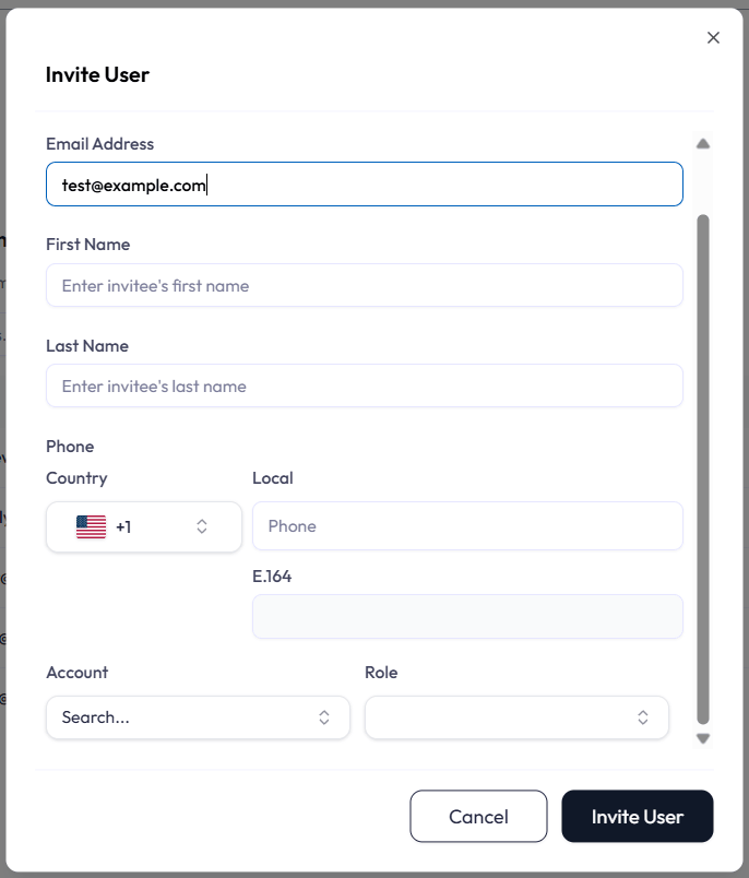 Invite User dialog. An Email field at the top. If the email is already registered, a hint says the email is already registered and to assign organizations and roles below. If it is new, First Name, Last Name, and Phone fields appear. Below that, a row pairing an Organization picker with an optional Role select.