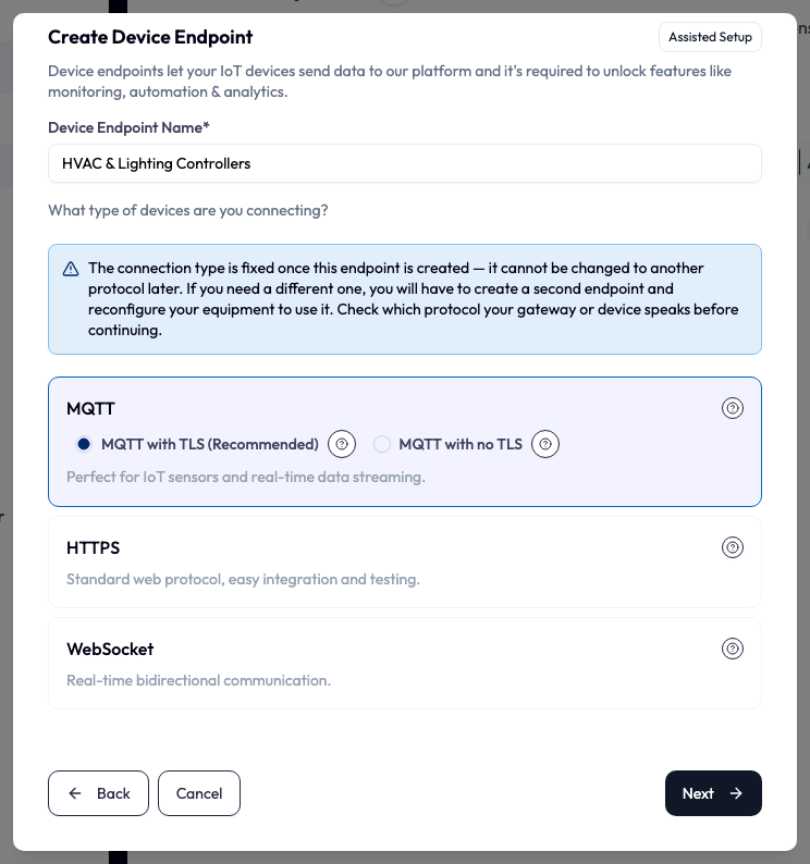 The Create Device Endpoint form with an Assisted Setup button at the top right. The Device Endpoint Name field reads HVAC and Lighting Controllers. A blue note warns that the connection type is fixed once the endpoint is created. Below it are cards for MQTT, HTTPS and WebSocket, each with a question-mark icon. MQTT is selected and shows two options, MQTT with TLS (Recommended), which is chosen, and MQTT with no TLS, each with its own question-mark icon. Back, Cancel and Next buttons sit at the bottom.
