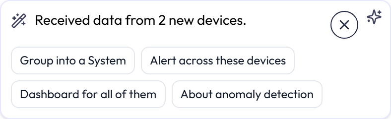 The assistant's suggestion card after two devices started reporting: Received data from 2 new devices, with a dismiss button and four actions, Group into a System, Alert across these devices, Dashboard for all of them, and About anomaly detection.